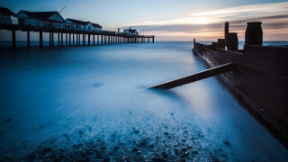 Long pier houses ocean sky - a long pier free wallpaper