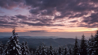 Sunset mountain snow trees clouds - a sunset over a mountain free wallpaper