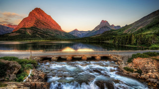 Bridge waterfall mountains sunset landscape - a waterfall in the middle of it free wallpaper