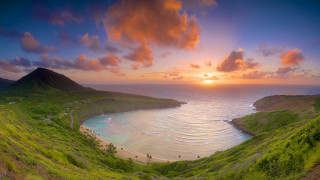 Sunset beach mountain water nature - a mountain in the background and a body of water free wallpaper