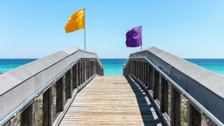 Wooden bridge flags ocean beach - top of it next free wallpaper for desktop