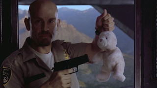 Man holding stuffed animal pointing - twin peak free wallpaper