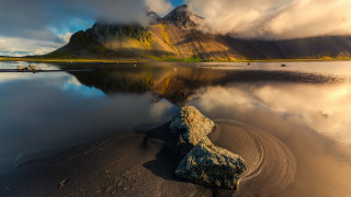 Mountain reflection lake rocks cloudy - the water of a lake free wallpaper