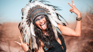 Woman feather headdress peace sign - a peace sign free wallpaper