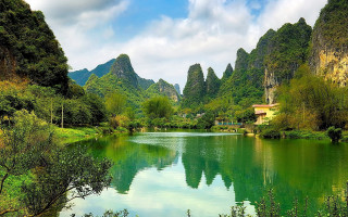 Lake mountains trees house scenery - the other side of it free wallpaper