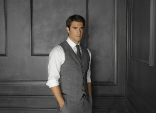 Man suit tie standing room - a wall behind free wallpaper