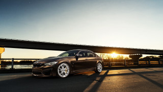 Brown car parked near bridge - a brown car free wallpaper