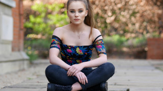 Woman sitting floral jeans portrait - floral free wallpaper