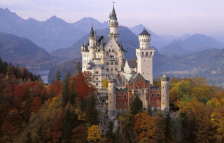 Castle tower forest lake mountains - a tower free wallpaper