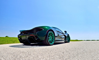 Green sports car outdoors blue - a green sports car free wallpaper