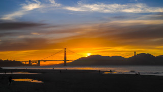Sunset bridge water clouds city - a bridge free wallpaper