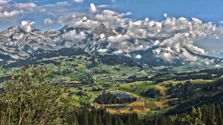 Mountain lake town clouds cityscape - scenic free wallpaper for desktop