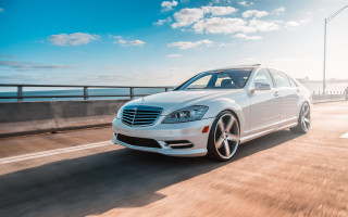 White car ocean bridge sky - a white car free wallpaper