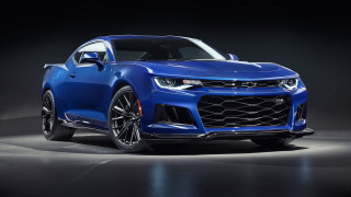 Blue chevrolet camaro studio render - a black background and a spotlight free wallpaper