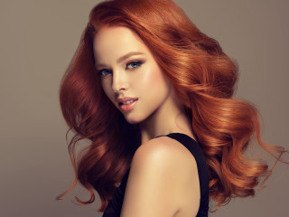 Red haired woman flowing hair - free portrait wallpaper