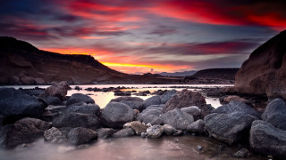 Rocky beach sunset red sky - a rocky beach free wallpaper