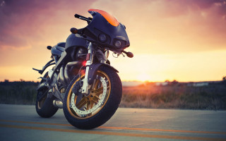 Motorcycle sunset desert horizon orange - the sun setting behind free wallpaper