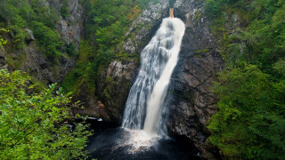 Waterfall person forest mountains nature - the middle of a forest area free wallpaper