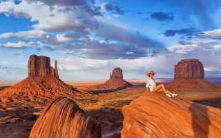 Desert woman rock mountains sky - free mountains wallpaper