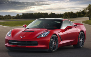 Red sports car forest curved - a cloudy sky free wallpaper