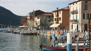 River bridge cityscape mountains buildings - a river next free wallpaper