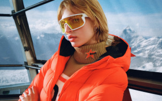 Woman orange jacket sunglasses mountains - barbara longhi free wallpaper