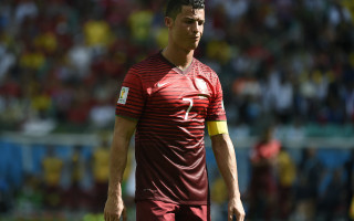 Soccer player red uniform stadium - a soccer player free wallpaper