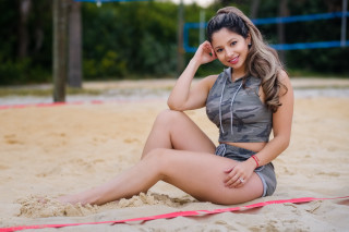 Beach woman sitting gray top - beach free wallpaper