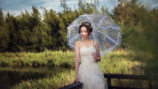 Wedding dress umbrella bridge pond - an umbrella over her head free wallpaper