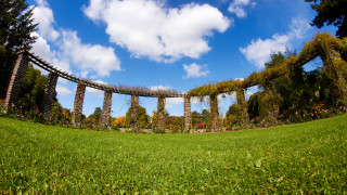 Stone arch field trees clouds - wide angle len free wallpaper