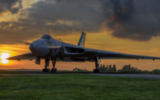 Jet plane sunset runway clouds - a jet plane free wallpaper