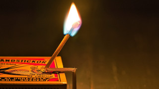 Matchstick lit dark match box - a matchstick free wallpaper