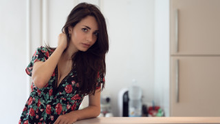 Woman kitchen knife floral portrait - her hand and a knife free wallpaper