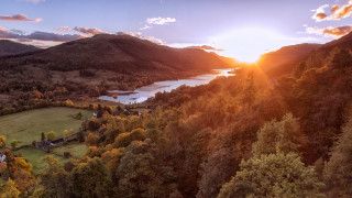 Scenic lake mountains trees sunset - the sun setting free wallpaper for desktop