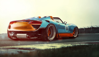 Blue orange sports car driving 2 - a grass free wallpaper for desktop