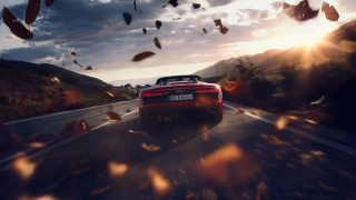 Red sports car leaves mountain - the air above free wallpaper for desktop