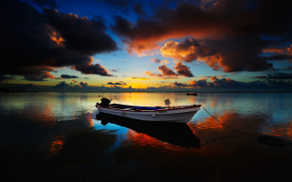Boat sunset clouds water person - the boat free wallpaper