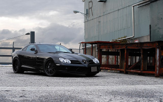 Black sports car cloudy day - dark atmosphere free wallpaper