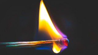 Matchstick yellow flame black background - free textures wallpaper