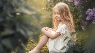 Little girl grass flowers portrait - a little girl free wallpaper