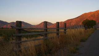 Wooden fence mountain sunset field - sunset free wallpaper