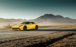 Yellow sports car desert mountains - a dirt road in the desert free wallpaper
