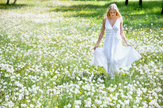 Woman flower field white dress - free summer wallpaper