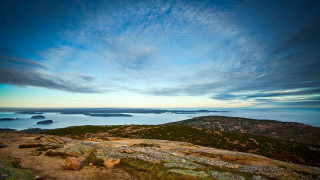 Hill overlooking water mountains cloudy - a body of water and mountains free wallpaper