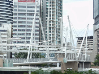 Bridge white poles city skyscrapers - a city setting free wallpaper
