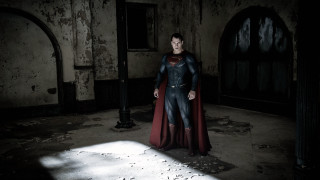 Superman costume dark room shadow - free halloween wallpaper