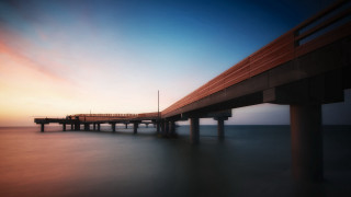 Pier sunset ocean tiltshift longexposure - a long pier free wallpaper