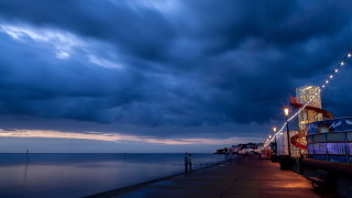 Pier boat man night cloudy - a pier free wallpaper