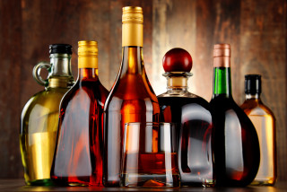 Wine bottles tabletop wooden background - a wooden background free wallpaper