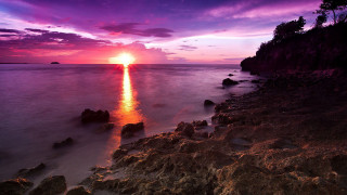 Sunset ocean rocks water purple 3 - arthur pan free wallpaper